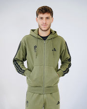 Chaqueta ESS Kaki Hombre adidas 25-26