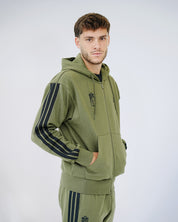 Chaqueta ESS Kaki Hombre adidas 25-26