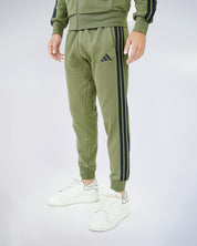 Pantalón ESS Kaki Hombre adidas 25-26